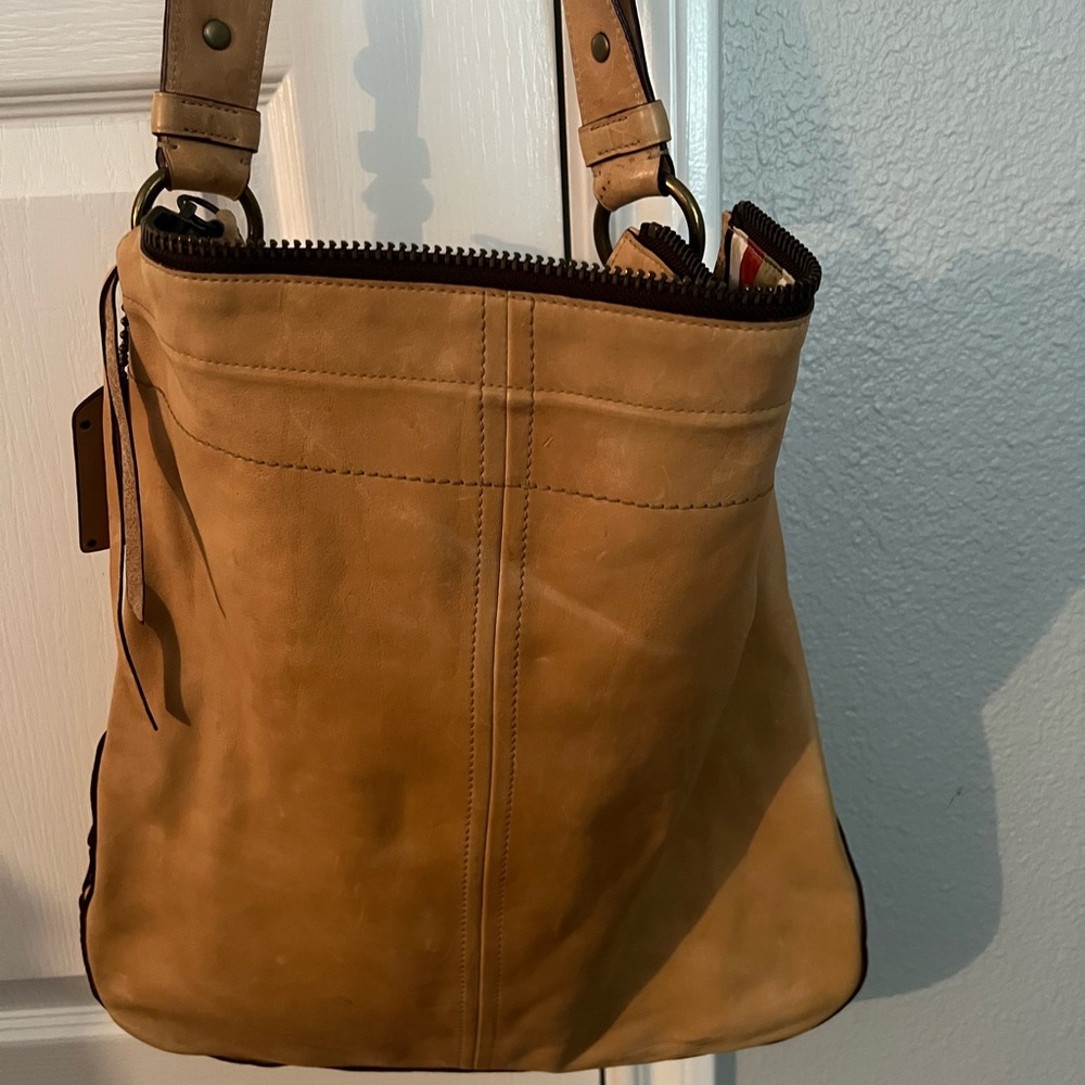 Authentic high end coach Crossbody vachetta leather